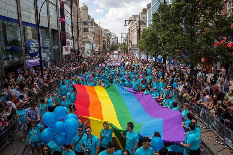 People take part in the annual Pride in London Parade on June 27, 2015 in London, England.