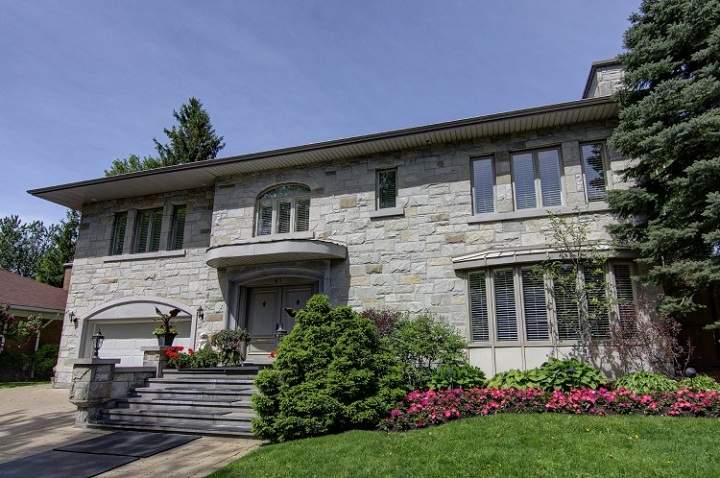 This Montreal luxury home came with a special bonus - an Italian sport car.