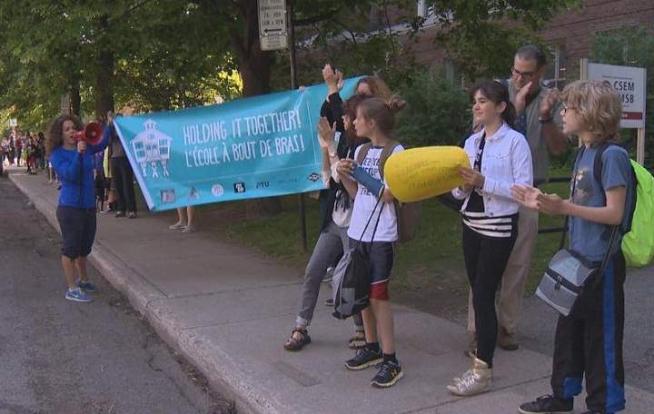 Parents, students and staff at Willingdon School in NDG formed a human chain to protect their school as a show of support to public schools currently under threat by the proposed cuts put forward by the Quebec government on June 4, 2015.