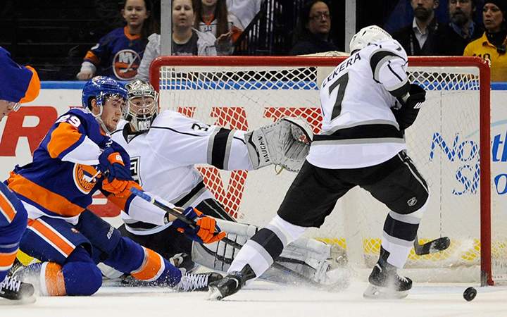 Los Angeles Kings goalie Jonathan Quick (32) and defenseman Andrej Sekera (7) during the first period of an NHL hockey game on Thursday, March 26, 2015, in Uniondale, N.Y. The Edmonton Oilers signed Sekera for six years at $33 million.