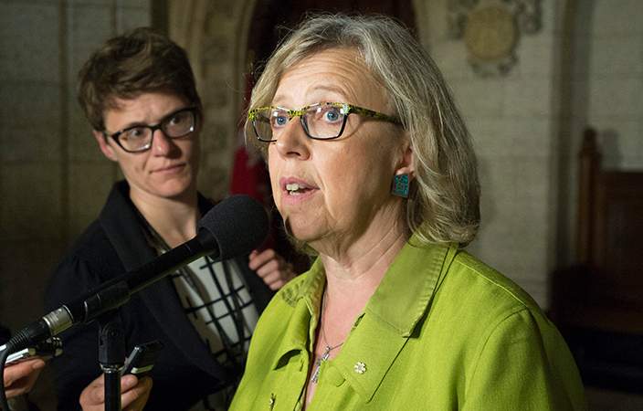 Green Party Leader Elizabeth May talks with media in Ottawa on Monday, June 8, 2015.
