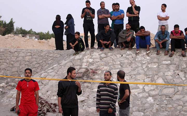 Egypt's security forces investigate the site of an explosion in Six of October district in Cairo on 30 Jun 2015.