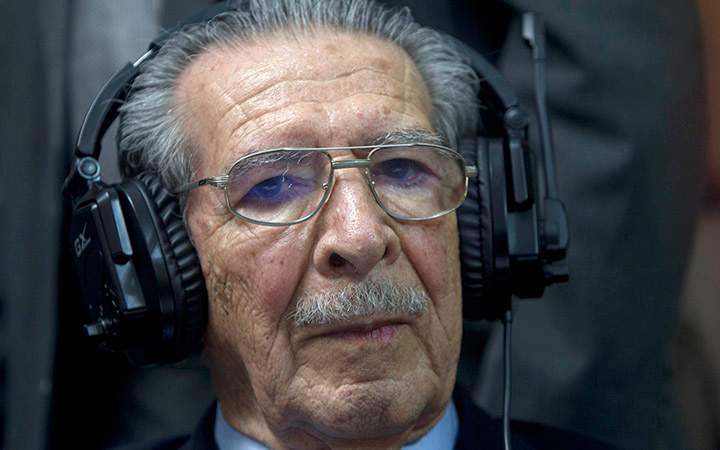 Guatemala's former dictator Jose Efrain Rios Montt wears headphones as he listens to the verdict in his genocide trial in Guatemala City on May 10, 2013. Prosecutors say Rios Montt is responsible for the deaths of almost 2,000 Mayan Indians, killed by the army between 1982 and 1983.