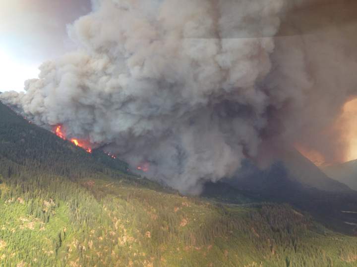 Flames spread along the mountainside in Boulder, B.C.