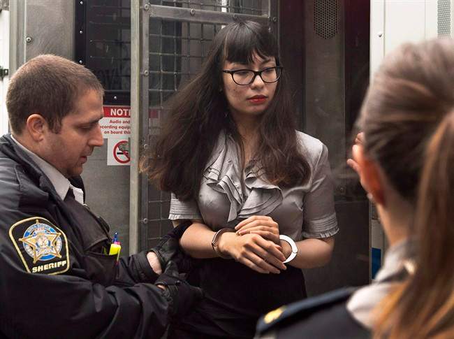 FILE: Lindsay Kantha Souvannarath arrives at provincial court for a preliminary hearing in Halifax on Wednesday, July 8, 2015. She's now plead guilty at the province's supreme court.