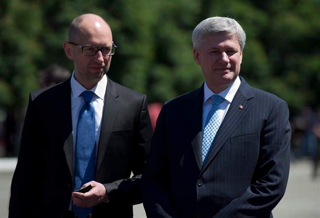 Prime Minister Stephen Harper and Ukraine Prime Minister Arseniy Yatsenyuk visit the Academic Institute of the National Academy of Internal Affairs of Ukraine for Training of Specialists for Public Safety, Psychological Service and National Guard of Ukraine Units in Kyiv, Ukraine Saturday, June 6, 2015. 
