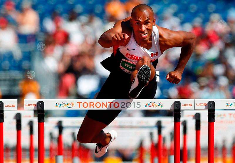 Damian Warner of Canada in the 110m hurdles in the men's decathlon during the athletics at the Pan Am Games in Toronto, Thursday July 23, 2015. 