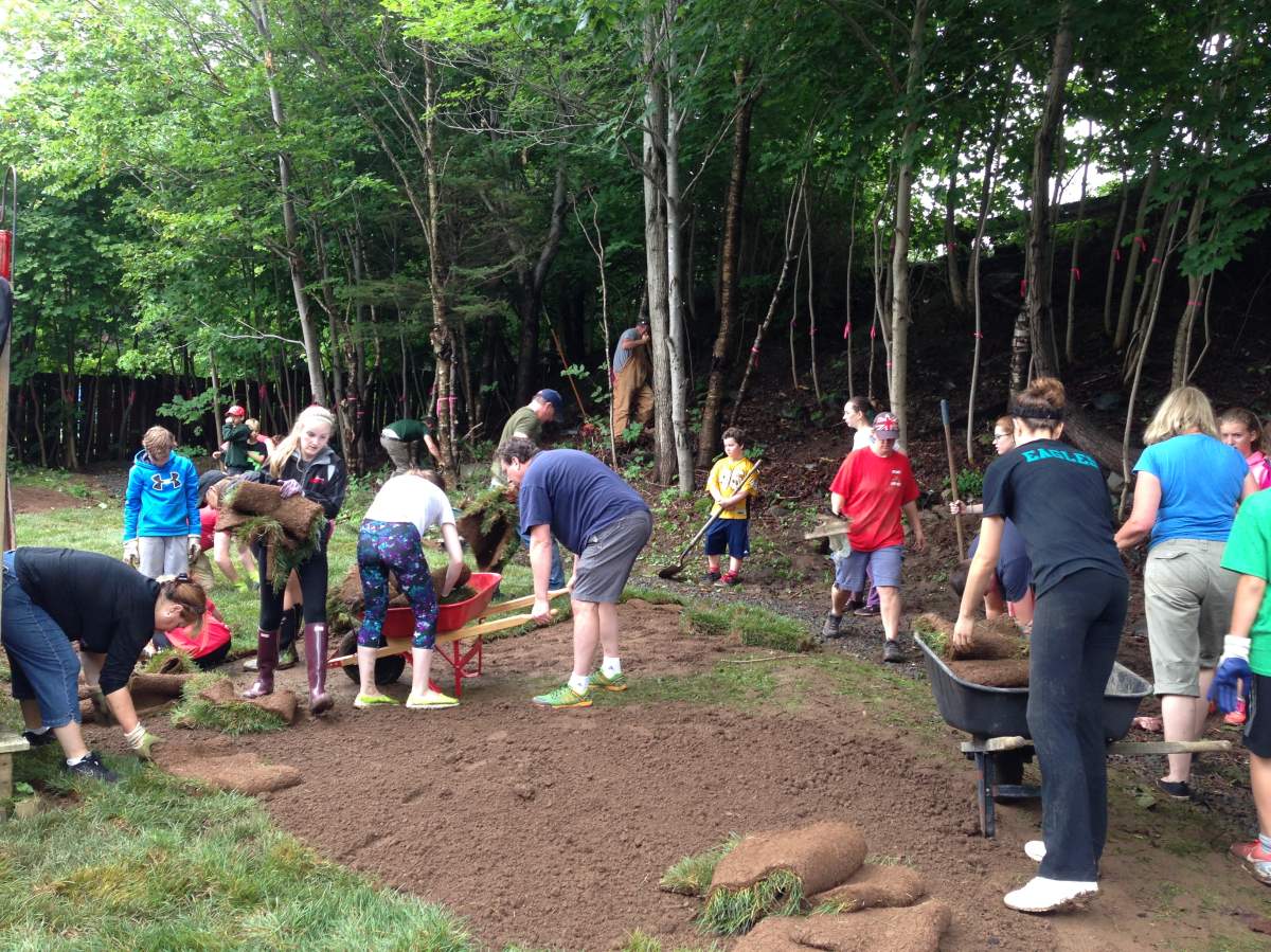 The community came together to make-over a backyard for 7-year-old Bryan, who is battling leukemia.