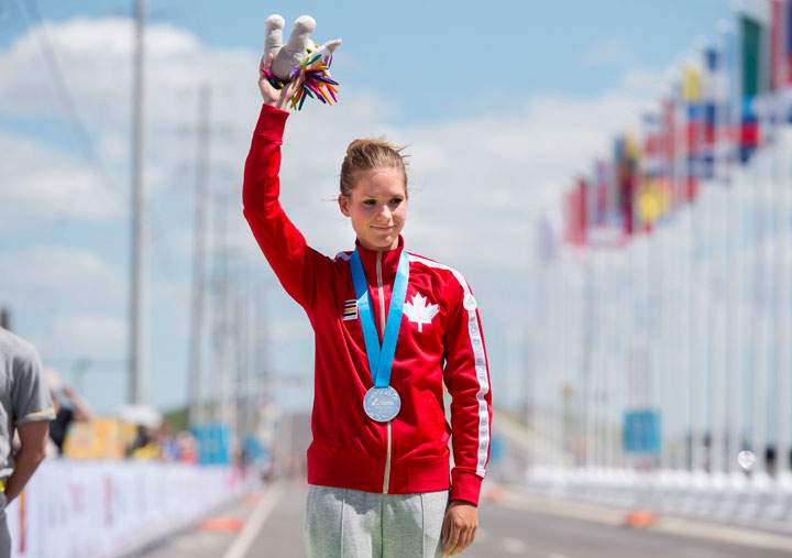 Jasmin Glaesser of Canada poses with her silver medal in women's individual time trial road cycling at the 2015 Pan Am Games in Milton, Ont. on Wednesday, July 22, 2015.