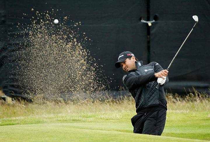 Australia’s Jason Day plays out of a bunker on the tenth hole during the final round at the British Open Golf Championship at the Old Course, St. Andrews, Scotland, Monday, July 20, 2015.