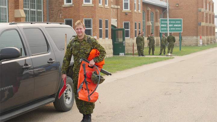 Canadian Forces troops getting ready to deploy from Prince Albert on July 7, 2015 to assist with fighting wildfires in northern Saskatchewan.