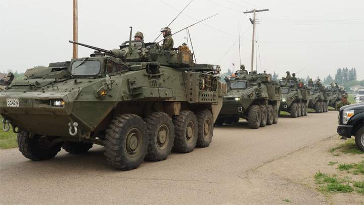 Canadian Forces troops getting ready to deploy from Prince Albert on July 7, 2015 to assist with fighting wildfires in northern Saskatchewan.