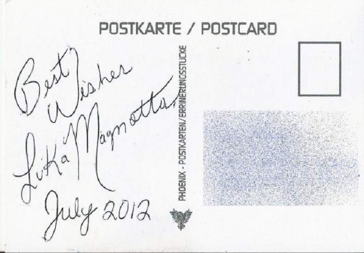 Behind the postcards, it's written "Best wishes, Luka Magnotta, July 2012"