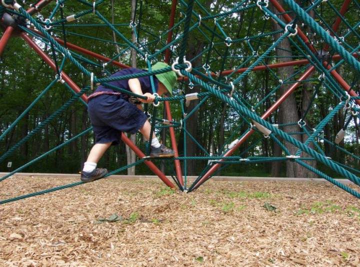 Playing on the obstacle course at Nathan Shuster park in Côte Saint-Luc.
