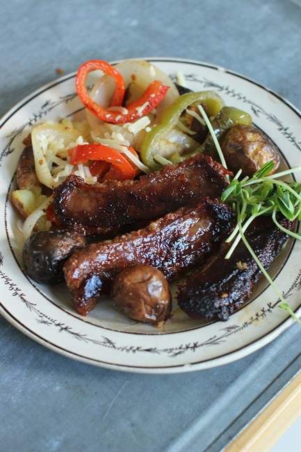 Sausages and potatoes become serious comfort on the grill