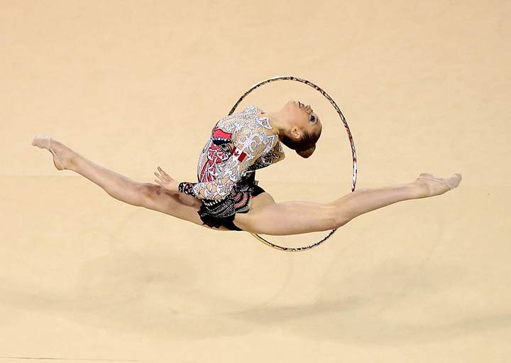 Canada’s Carmen Whelan competes in the rhythmic gymnastics hoop finals on Day 9 of the Toronto 2015 Pan Am Games on July 19, 2015.