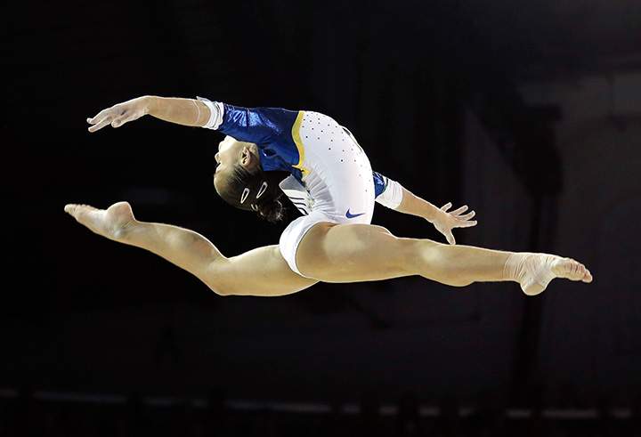 Brazil’s Flavia Lopes performs on the balance beam during women’s artistic gymnastics team competition in the Pan Am Games in Toronto on Sunday, July 12, 2015.