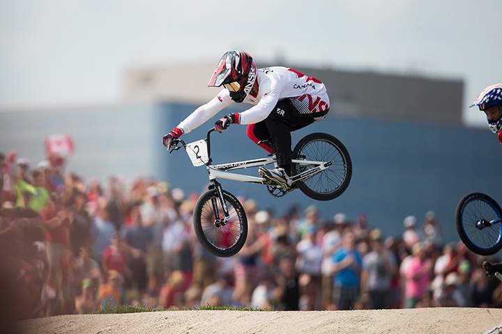 Canada’s Tory Nyhaug rides to victory in the BMX race at the 2015 Pan American Games in Toronto on July 11, 2015.