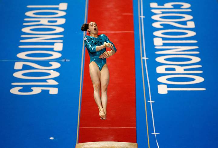 Canada’s Isabela Onyshko competes on the vault during the women’s all-around artistic gymnastics final on Day 3 of the Toronto 2015 Pan Am Games on July 13, 2015.