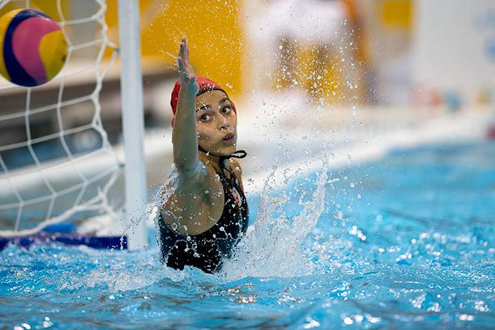 A ball gets by Canadian goalkeeper Jessica Gaudreault in the water polo final between Canada and the United States at the Pan Am Games in Markham, Ontario, Tuesday, July 14, 2015.