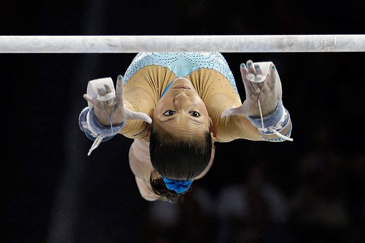 Venezuela’s Jessica Lopez performs during the women’s artistic gymnastics uneven bars competition in the Pan Am Games in Toronto, Tuesday, July 14, 2015.