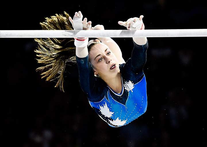 Canada’s Isabela Onyshko competes in the uneven bar at the women’s artistic gymnastics competition during the Pan American Games in Toronto on Tuesday, July 14, 2015.