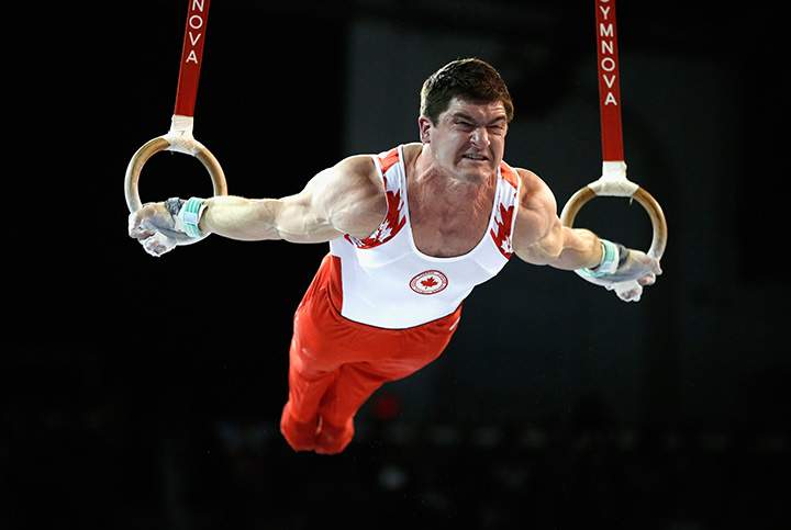 Canada’s Kevin Lytwyn competes on the rings during the artistic gymnastics finals on Day 4 of the Toronto 2015 Pan Am Games on July 14, 2015 in Toronto, Canada.