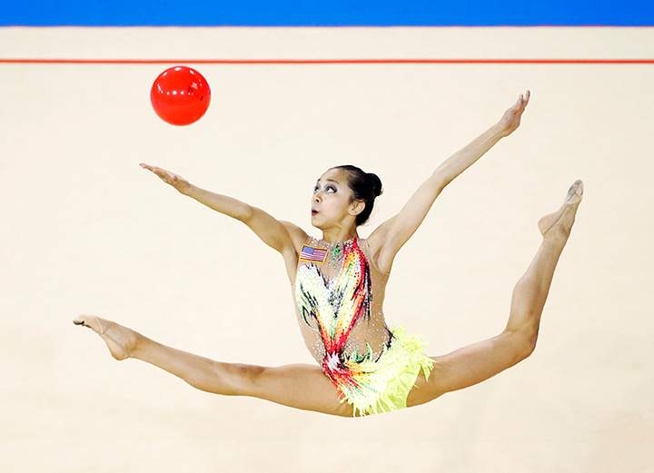 Laura Zeng, of the United States, performs in the rhythmic gymnastics competition at the Pan Am Games Sunday, July 19, 2015, in Toronto.