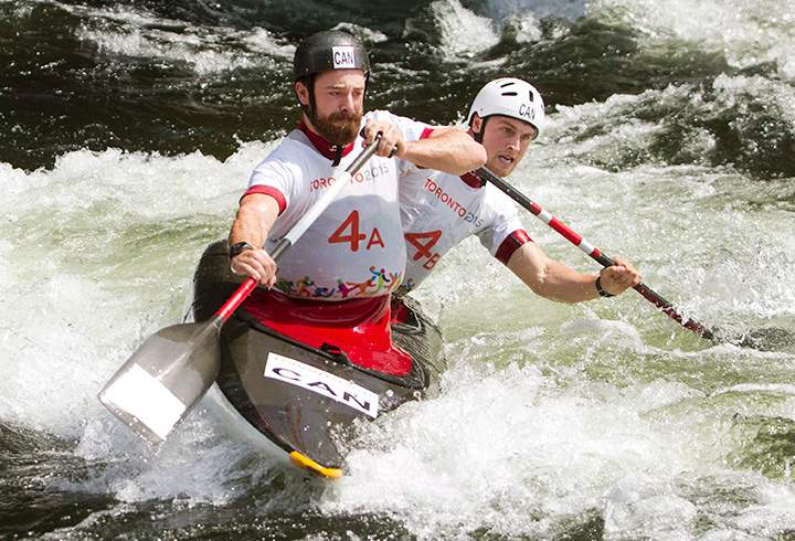 Canada’s Ben Hayward and Cameron Smedley negotiate gates in the semi-final of the Men’s Canoe event at the Minden White Water Preserve at the Pan American Games in Minden, Ont., on Sunday, July 19, 2015.