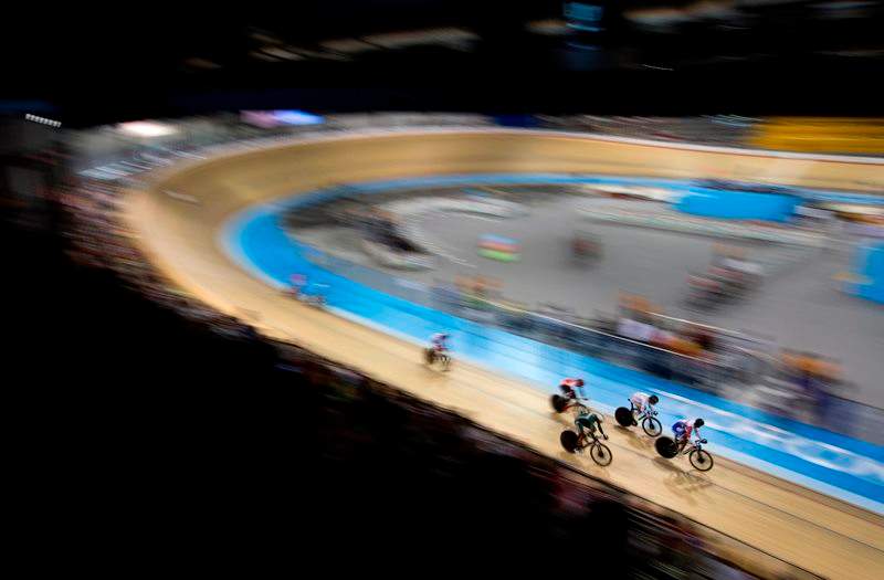 Athletes compete during the men's omnium scratch track cycling event at the Pan Am Games in Milton, Ontario, Thursday, July 16, 2015. 