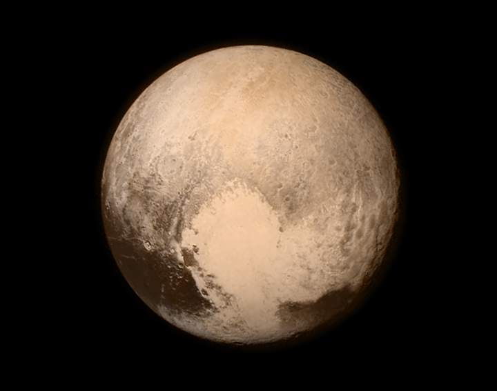 This new image of Pluto, taken by New Horizons on July 13, 2015, shows the planet in incredible detail.