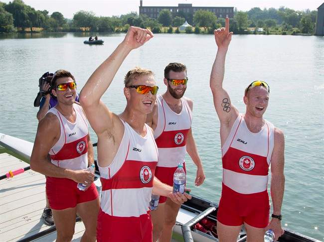 Canada’s (left to right) Tim Schrijver, Kai Langerfeld, Conlin McCabe, and Will Crothers waves to fans after winning gold in the the men’s coxless four final at the 2015 Pan Am Games at the Royal Canadian Henley Rowing Course in St.Catharines, Ont. on Monday, July 13, 2015.