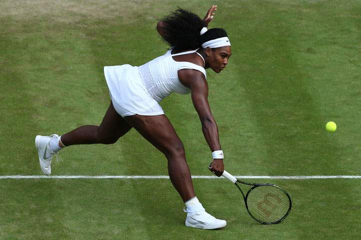 US player Serena Williams returns against Britain’s Heather Watson during their women’s singles third round match on day five of the 2015 Wimbledon Championships at The All England Tennis Club in Wimbledon, southwest London, on July 3, 2015. Williams won 6-2, 4-6, 7-5.