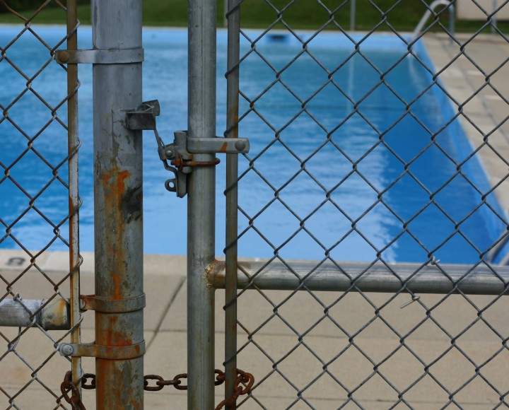 A file photo of a fenced off pool.