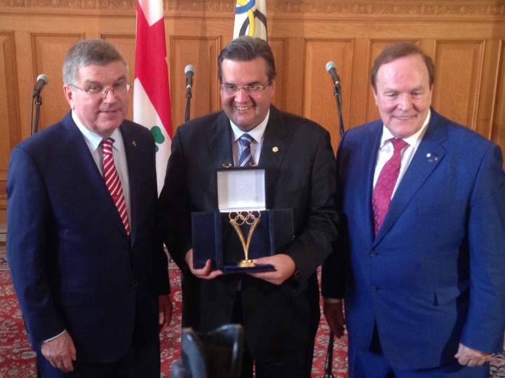Thomas Bach, president of the International Olympic Committee and Marcel Aubut, head of the Canadian Olympic Committee, meet with Montreal mayor Denis Coderre as part of Olympic Excellence Day on Thursday, July 9, 2015.