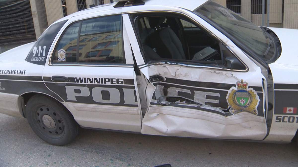 A damaged Winnipeg police cruiser is shown on July 20, 2015 after it was hit outside of police headquarters on Princess Street.