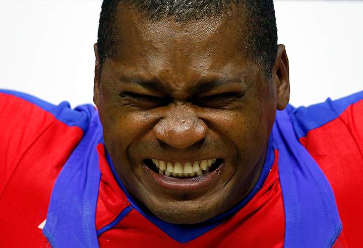 Alejandro Cisnero of Cuba competes in the weightlifting 105kg final on Day 5 of the Toronto 2015 Pan Am Games on July 15, 2015.