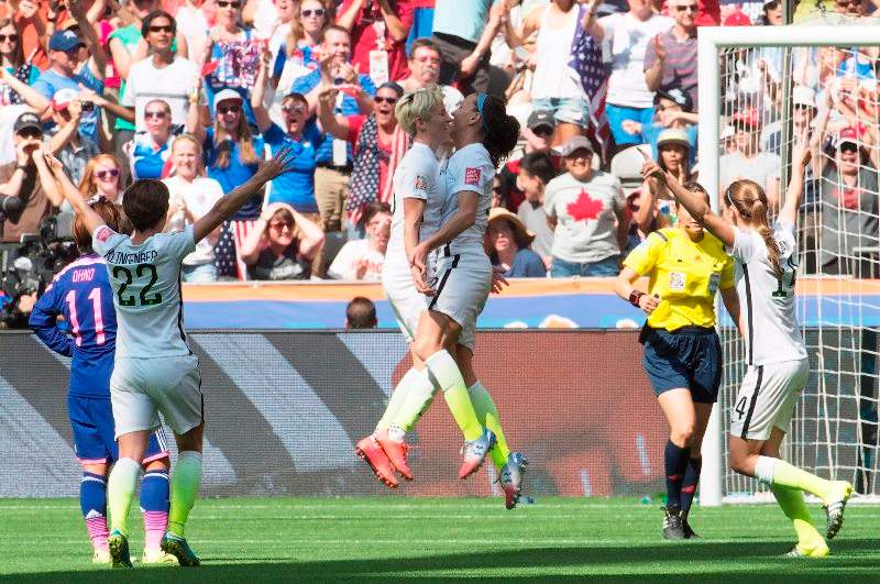 United States’ Lauren Holiday, centre right, Megan Rapinoe, centre left, Meghan Klingenberg (22) and Morgan Brian (14) celebrate Holiday’s goal against Japan during first half action in the FIFA Women’sWorld Cup soccer final in Vancouver, B.C., on Sunday, July 5, 2015.