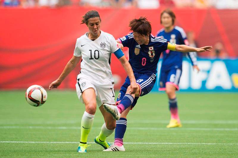Japan’s Aya Miyama, right, is challenged by United States’ Carli Lloyd during first half action in the FIFA Women’s World Cup soccer final in Vancouver, B.C., on Sunday, July 5, 2015.