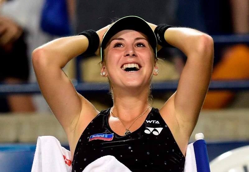Belinda Bencic, of Switzerland, smiles after defeating Serena Williams, of the United States, during Rogers Cup semi-final tennis action in Toronto on Saturday, August 15, 2015.