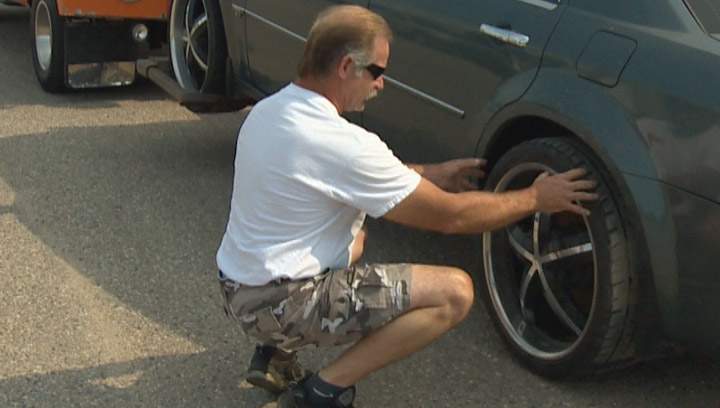 Lynn Scrimshaw describes space needed to change vehicle tire