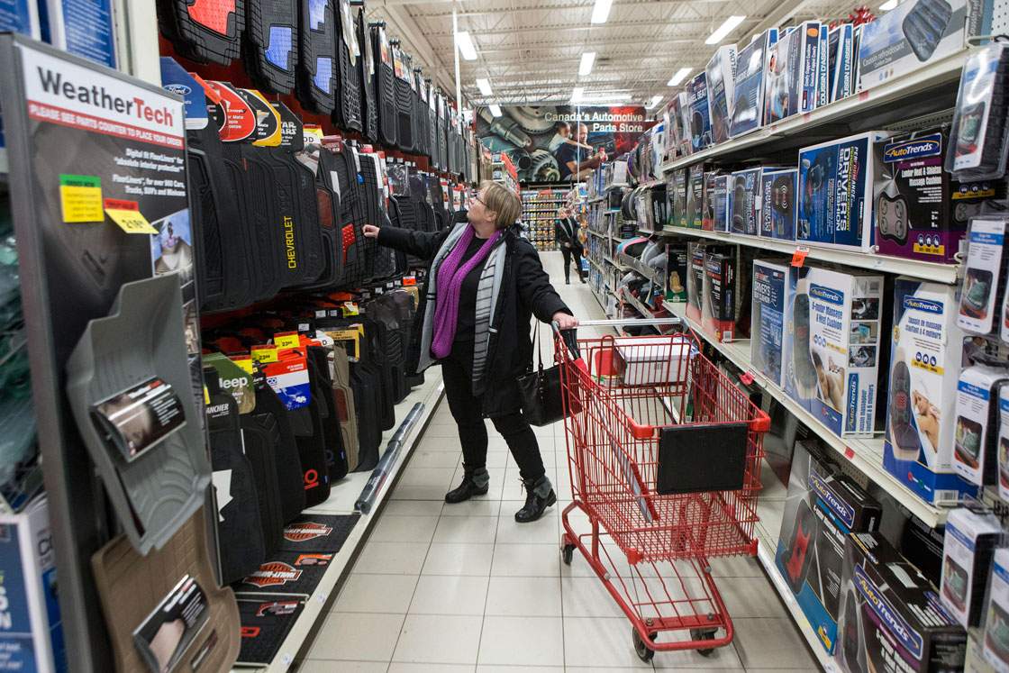 A customer looks through merchandise at a Canadian Tire Store in Mississauga, Ont.