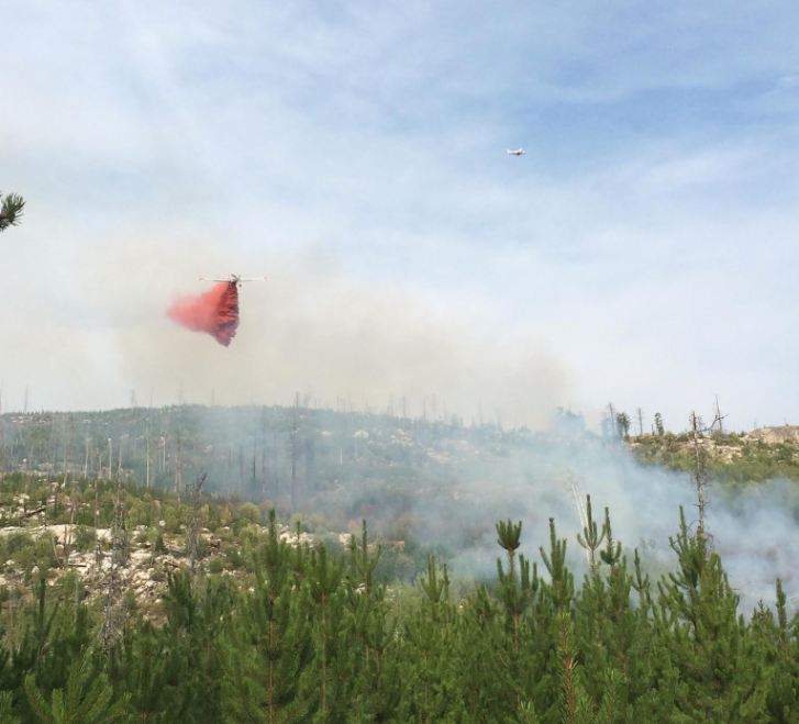 Retardant being dropped near Naramata Monday evening.