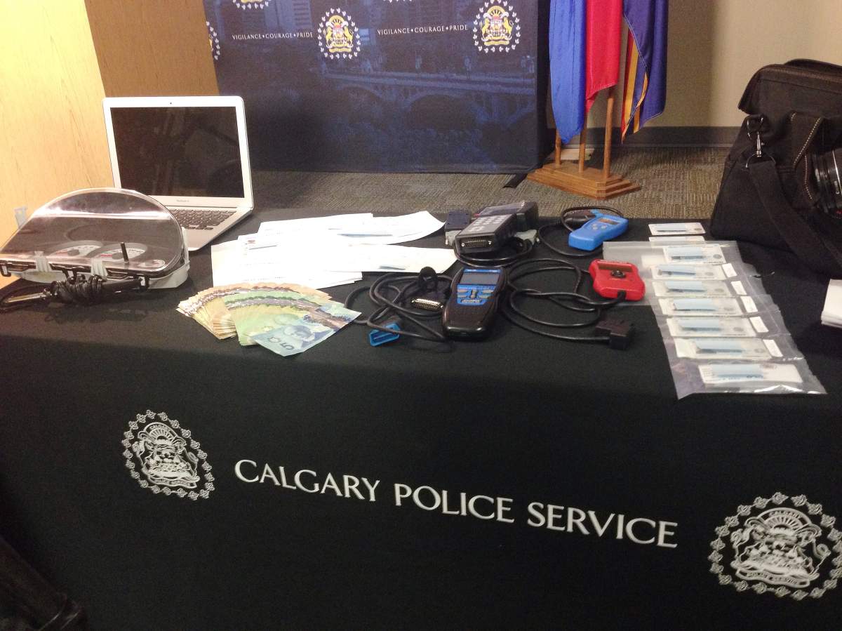 Calgary police display items seized from in the 0-100 block of Rocky Ridge Circle N.W. on August 6, 2015.