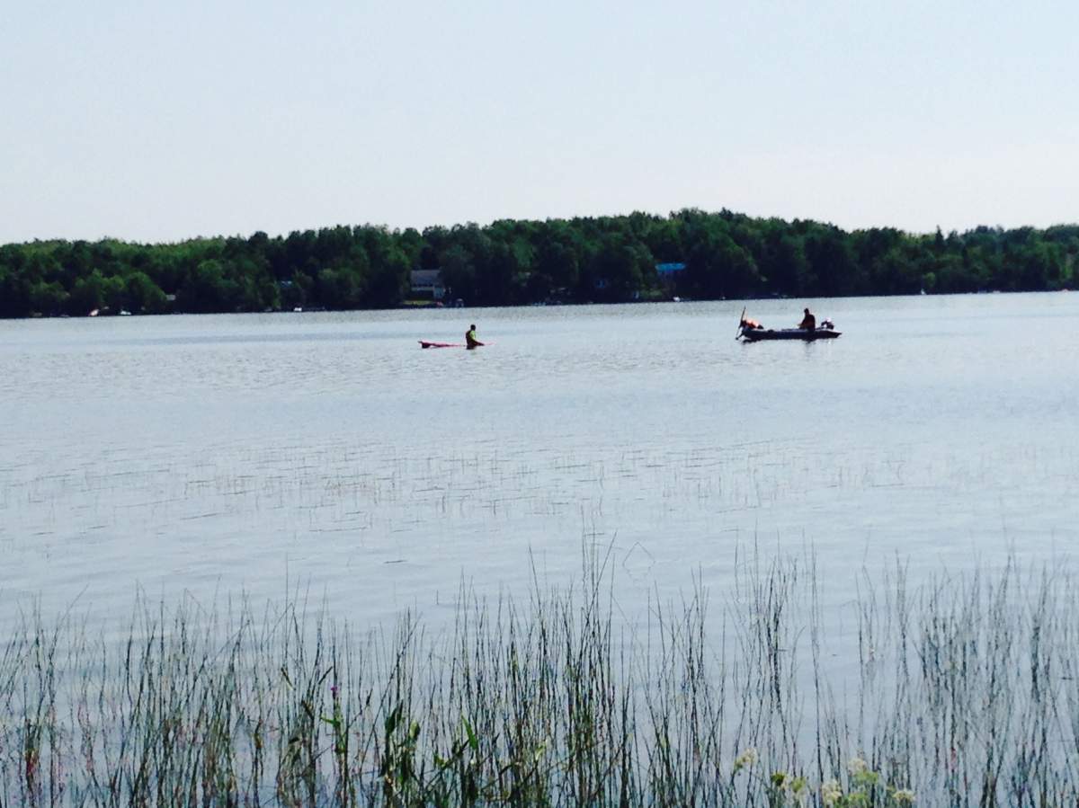 Neighbours took their own boats out to help search for a missing man on Shortts Lake.
