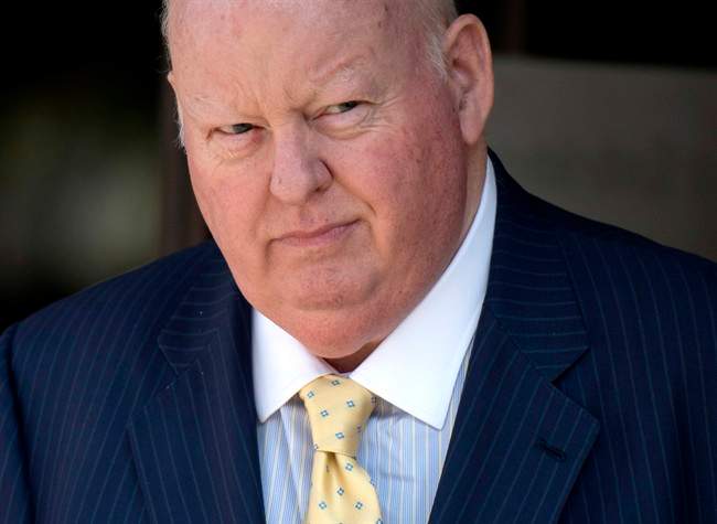 Former Conservative Senator Mike Duffy leaves the courthouse in Ottawa Aug. 19.