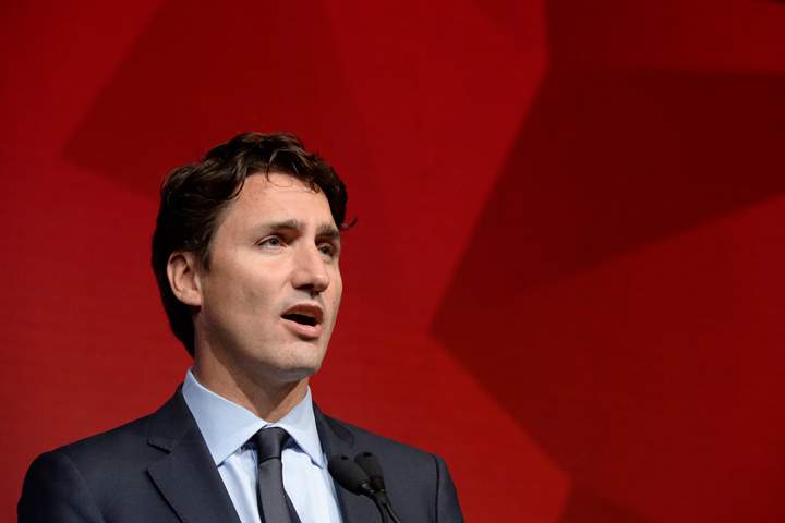 Liberal Leader Justin Trudeau speaks to supporters as he attends a gala in Toronto Thursday, August 27, 2015. THE CANADIAN PRESS/Paul Chiasson