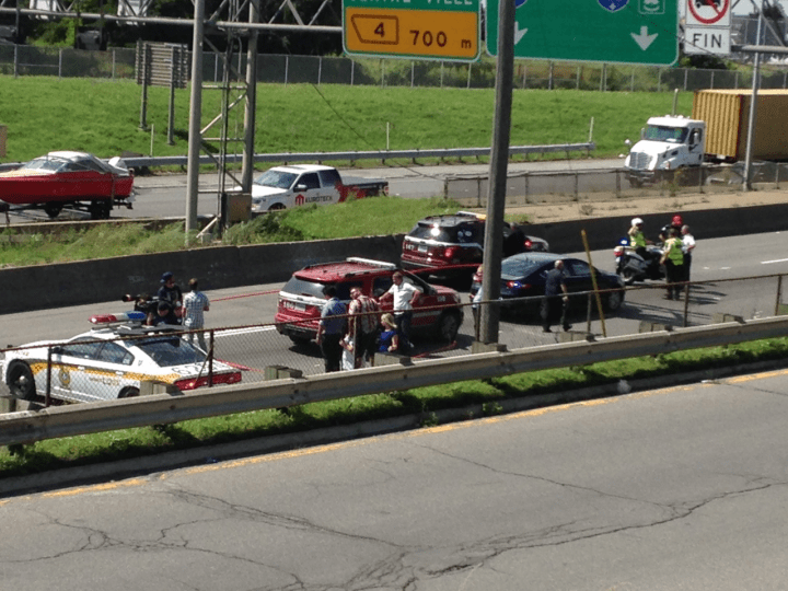 Cars outside the Lafontaine tunnel as authorities take care of a truck that caught fire, Thursday, August 20, 2015.
