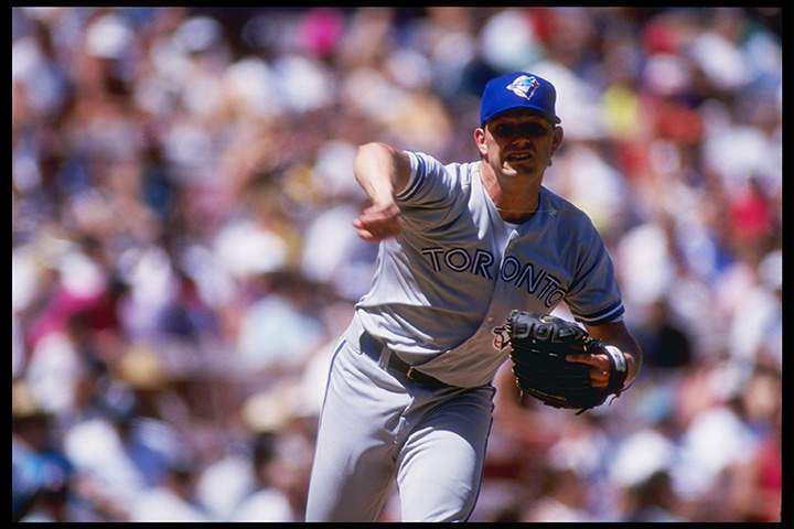 Pat Hentgen throws a pitch during a game against the California Angels at Anaheim Stadium in Anaheim, California.