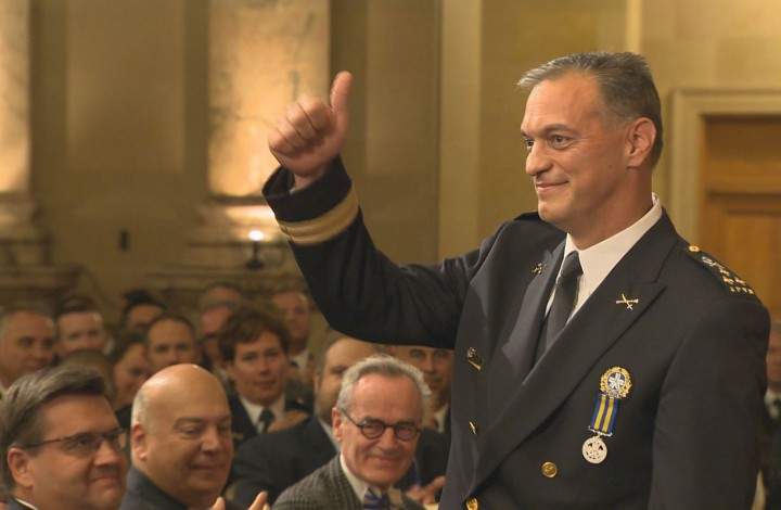 Philippe Pichet gives a thumbs up as he is sworn in as Montreal's new police chief, Friday, August 28, 2015.